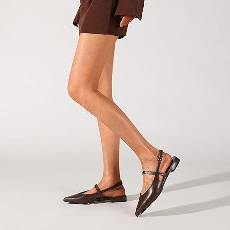 Brown dress with matching shoes on a white background